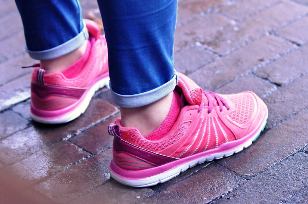 Close up of feet in pink running shoes