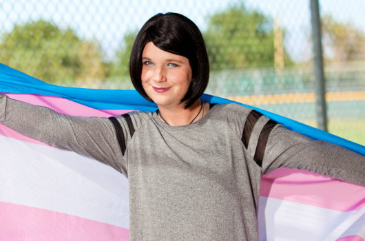 transwoman with trans flag