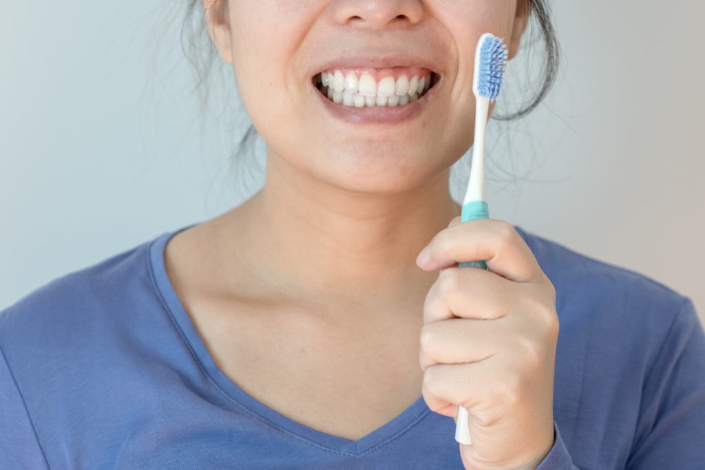 Close up of big smile and toothbrush
